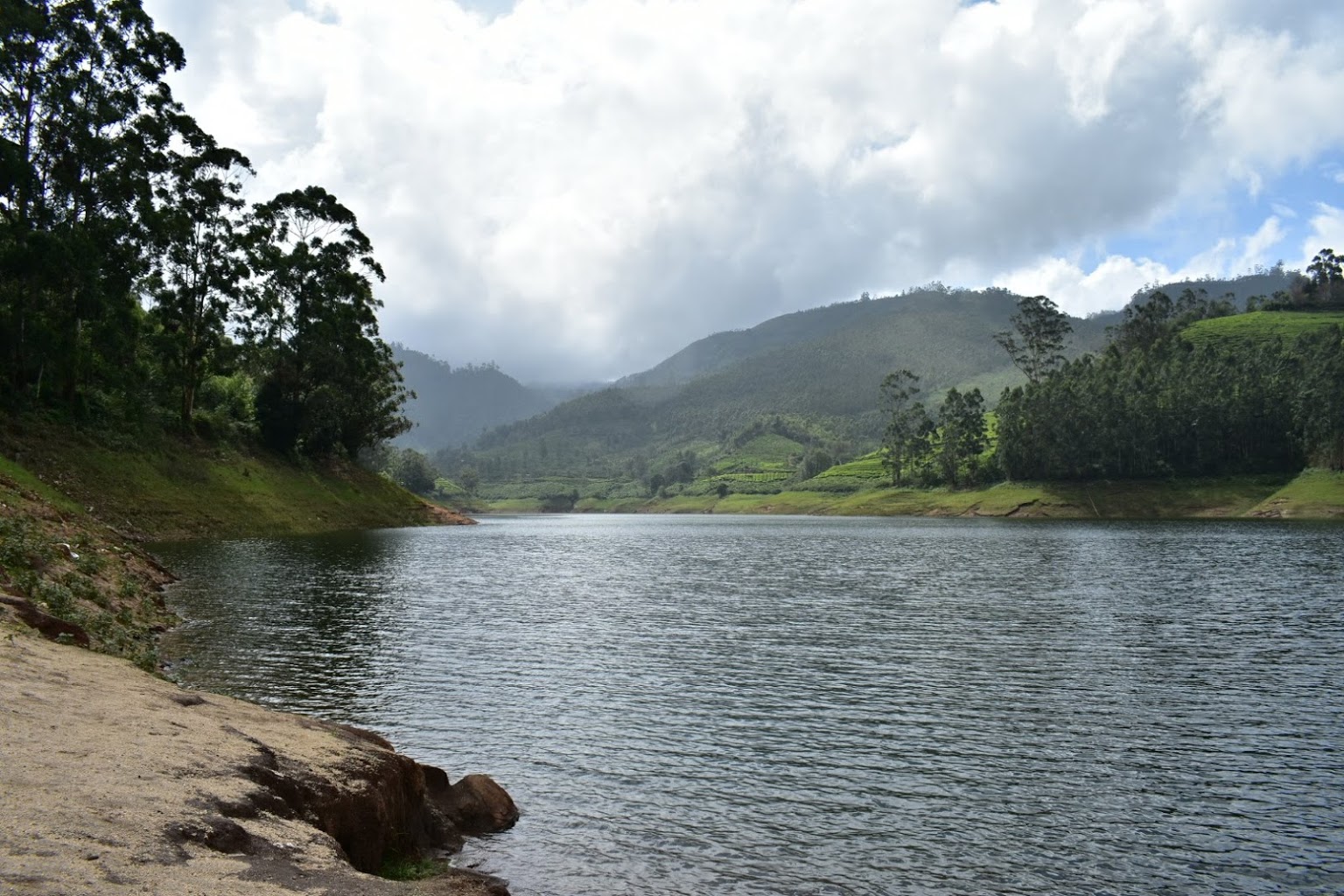 shore of a wide dam in Munnar
