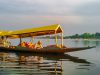 A man driving the Boat in the lake in Jammu and Kashmir