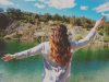 women infront of lake