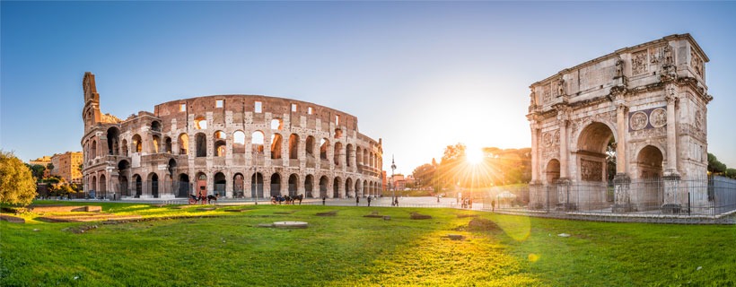 Large Ancient Building With People Visiting