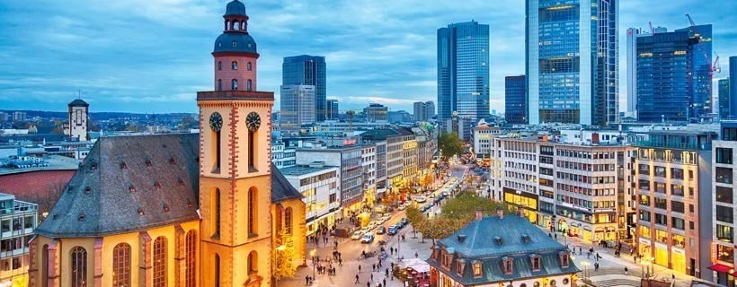 Modern Metro City In The Evening With People On The Streets